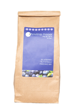 Load image into Gallery viewer, Blueberry Pancake Mix in a brown kraft bag with a blue label. Made with local, organic whole wheat flour. Great breakfast staple.