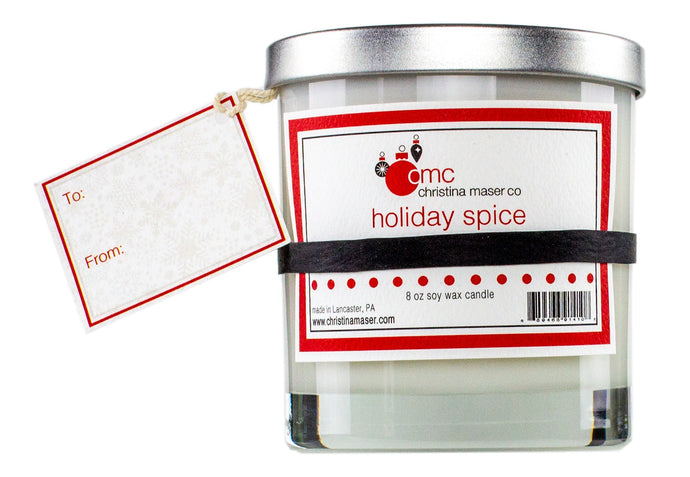 Holiday spice holiday special edition soy wax candle. 8 oz clear glass tumbler with silver metal lid. includes blank gift tag. great for holiday shopping and holiday gifting.