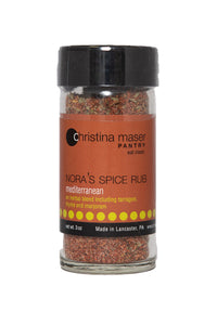 Mediterranean Spice rub in clear glass jar with rich brown label with green and white accents.