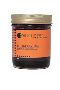 Blueberry Jam with Fresh Basil in a glass mason jar. Handmade in small batches in Lancaster, PA.