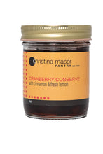 Load image into Gallery viewer, Cranberry Conserve small batch jam. Hand made with organic ingredients. Has an orange wraparound label with red and black text.
