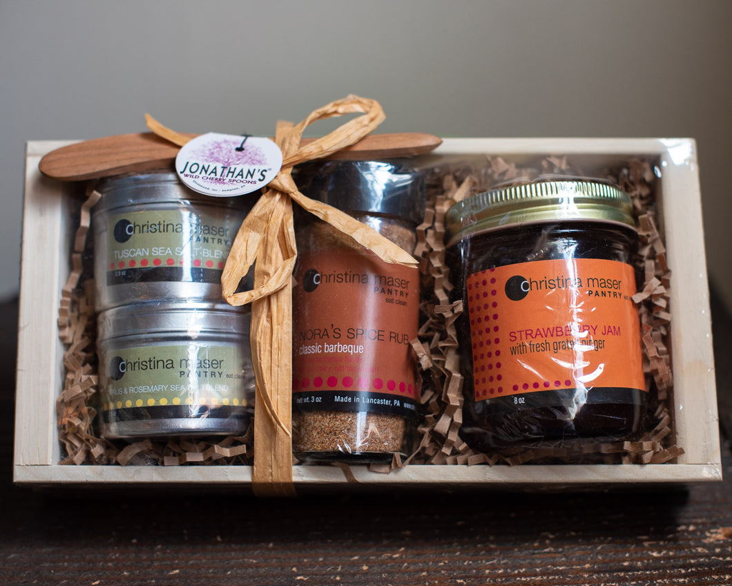 Christina Maser gift set in pale wood crate. Features two salt blends, one spice rub, and strawberry jam. Includes handmade wild cherry spreader by Jonathan's Spoons.