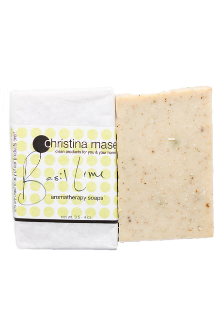 Photo of Basil Lime vegan bar soap. Wrapped bar in white paper with light green polka dots.