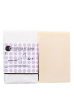 Load image into Gallery viewer, Lavender citrus vegan bar soap. Soap is natural colored and wrapped in white paper. Label has light purple dot accents and black text.
