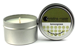 Lemongrass soy wax candle in silver metal tin. Tin comes with lid featuring forest green label.