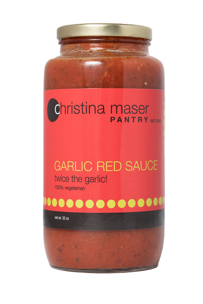 Garlic Red Sauce for pasta or pizza. Large clear glass jar with red label with green accents.